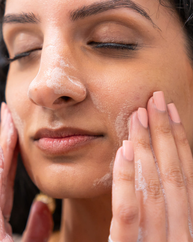 Woman Cleaning Her Face
