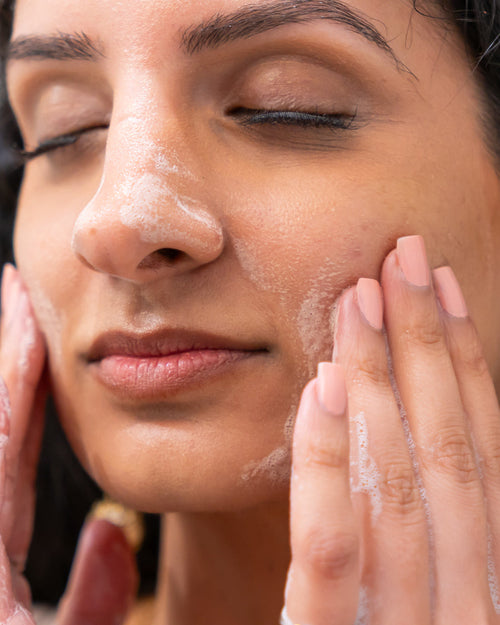 Woman Cleaning Her Face