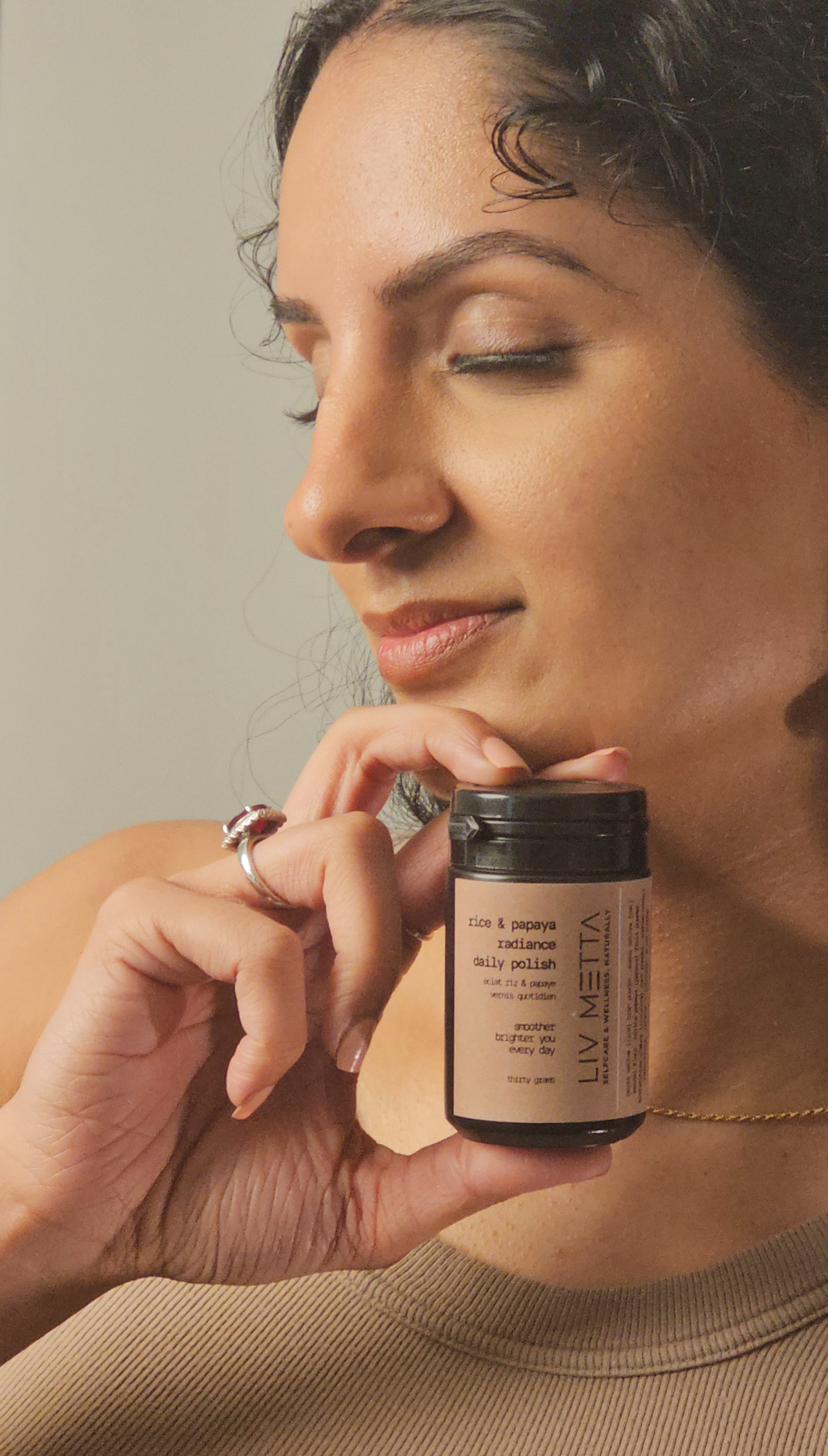 Woman holding Rice Papaya tub 