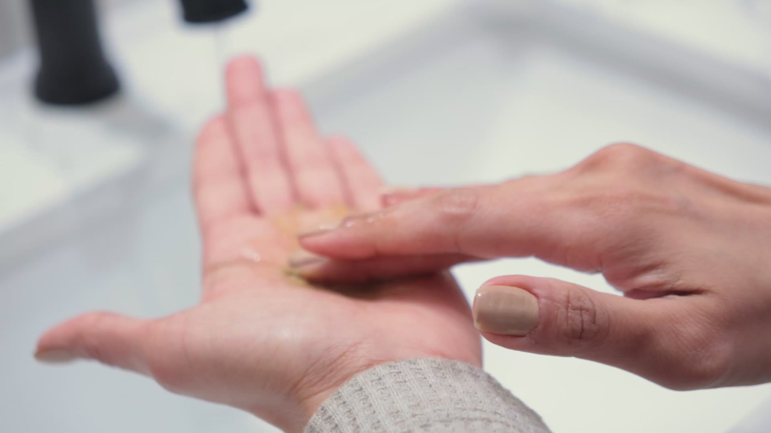 Woman making a paste in her palm